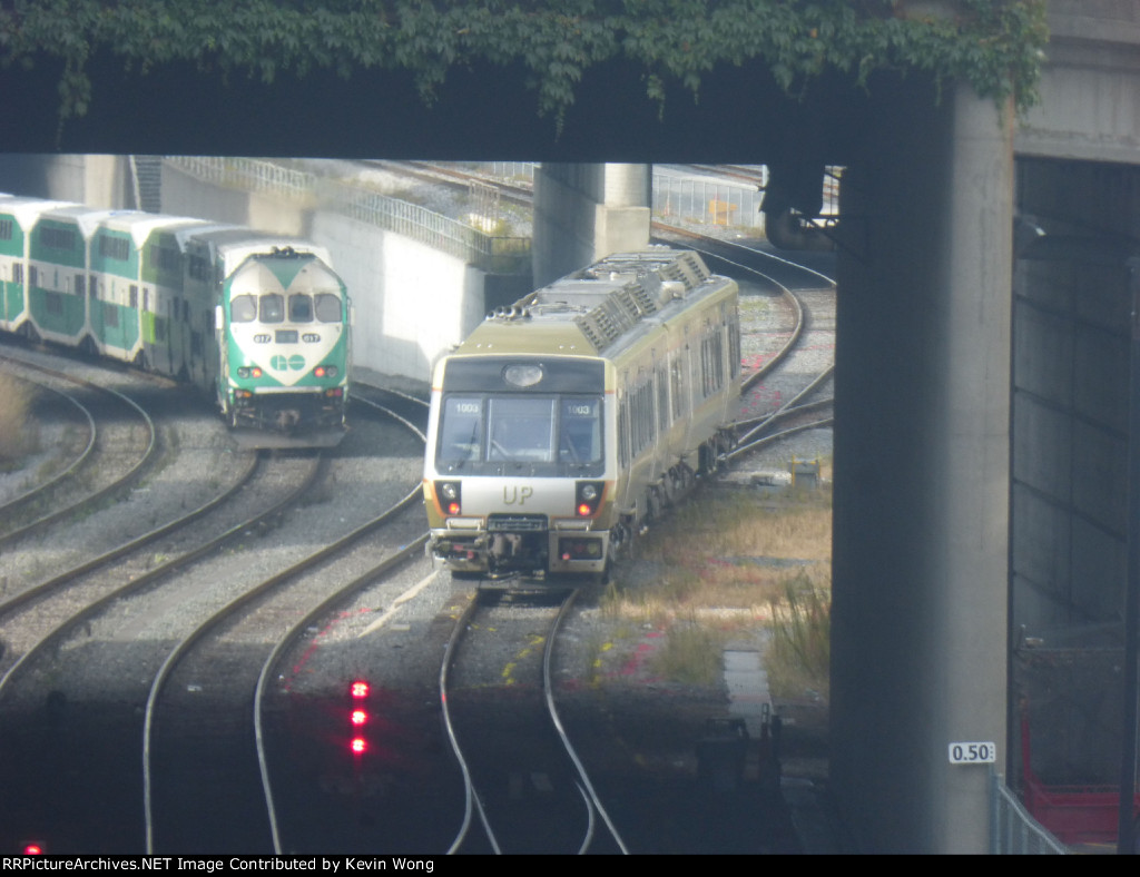 Outbound UP Express and GO Transit Lakeshore West train at Blue Jays Way